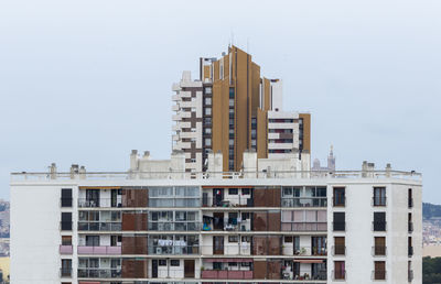 Low angle view of buildings against clear sky