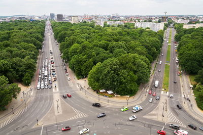 High angle view of vehicles on road in city