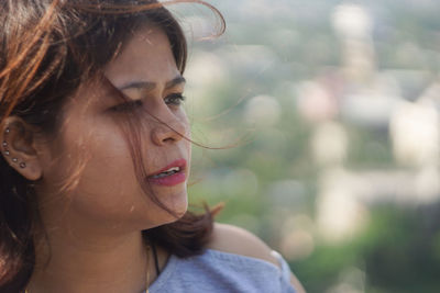 Close-up portrait of young woman