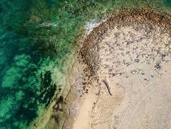 High angle view of sand on beach