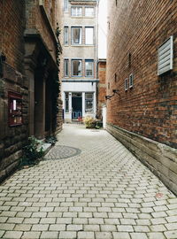 Narrow alley along buildings