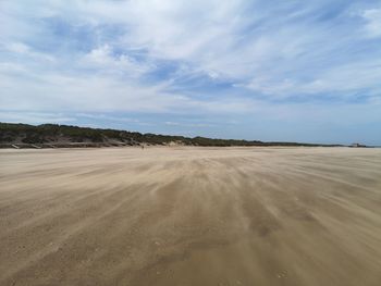 Scenic view of desert against sky