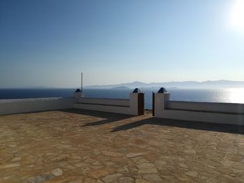 Scenic view of sea against clear blue sky