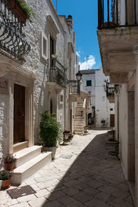 Narrow alley amidst buildings in town