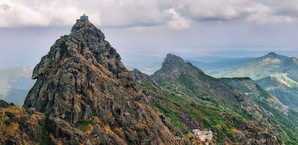 Panoramic view of rock formations against sky