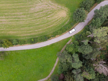 High angle view of road amidst field