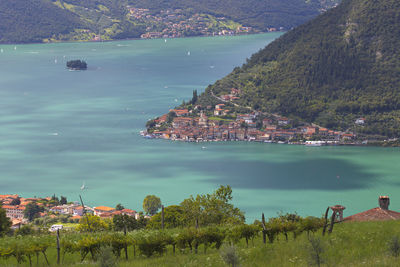 High angle view of townscape by sea