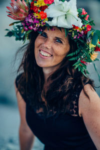 Close-up portrait of smiling young woman