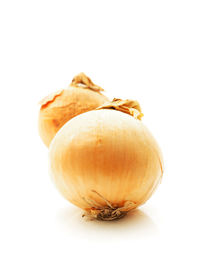 Close-up of fruit over white background