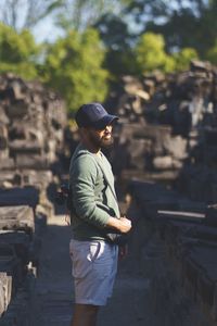 Rear view of man standing outdoors