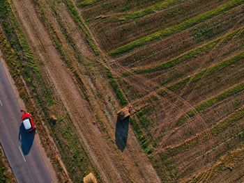 High angle view of road amidst agricultural field