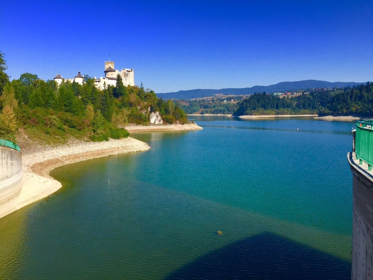 SCENIC VIEW OF SWIMMING POOL AGAINST CLEAR SKY