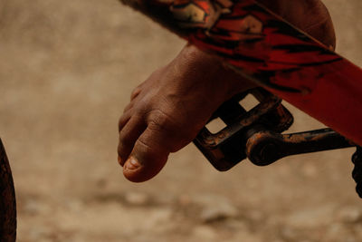 Close-up of man holding camera