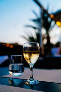 Close-up of wineglass on table