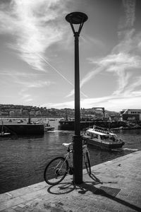 Boats moored in river