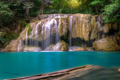 Erawan waterfall with clear turquoise water at kanchanaburi, thailand