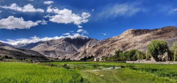 Scenic view of snowcapped mountains against sky