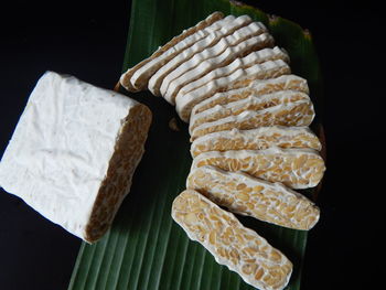 High angle view of breakfast on table against black background