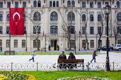 People in front of building