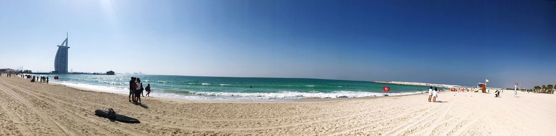 Scenic view of beach against clear sky