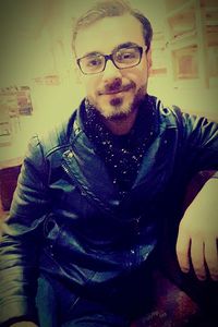 Close-up portrait of man at home