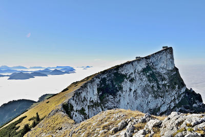 Scenic view of snowcapped mountains against clear sky