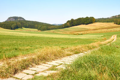 Scenic view of land against sky