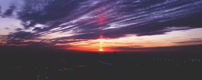 Scenic view of dramatic sky during sunset