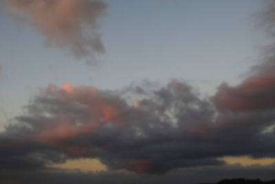 Low angle view of dramatic sky during sunset