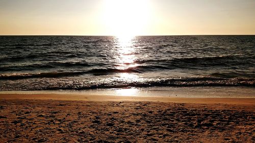 Scenic view of sea at sunset