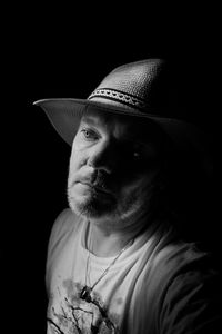 Portrait of young man wearing hat