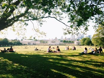 People relaxing in park