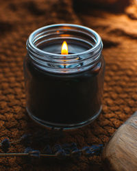 High angle view of tea light candles on table