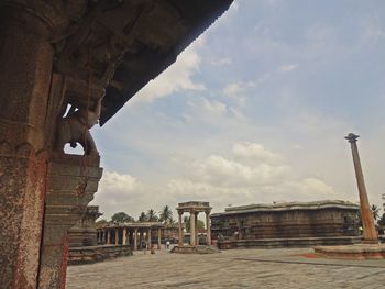 View of old building against cloudy sky