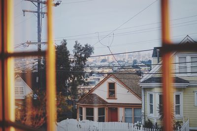 Buildings in city against sky