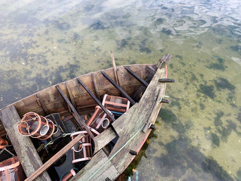 High angle view of abandoned boat moored at lake