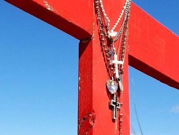 Low angle view of crane against clear sky