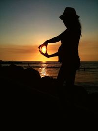 Scenic view of sea at sunset