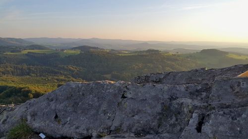 Scenic view of landscape against sky during sunset