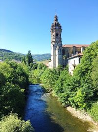 View of castle against clear blue sky