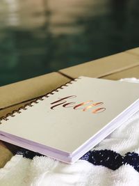 High angle view of text on book at table