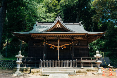 View of temple building in forest