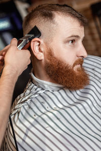 Barber grooming customer