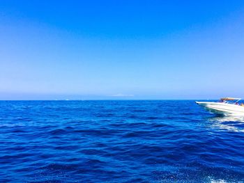 Scenic view of calm sea against clear sky