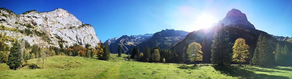 Panoramic view of rocky mountains against sky