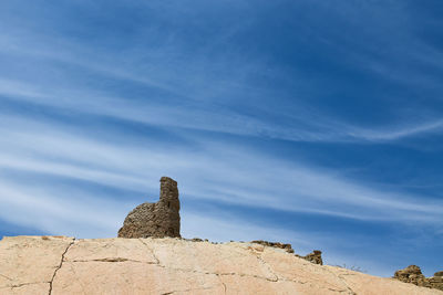 Low angle view of fort against blue sky