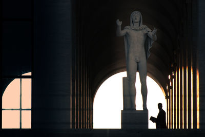Silhouette of statue against clear sky