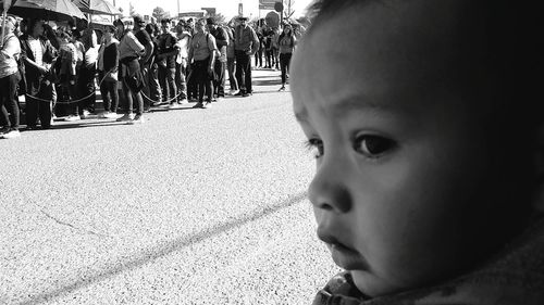 Close-up portrait of cute baby looking away