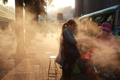 People on street in city