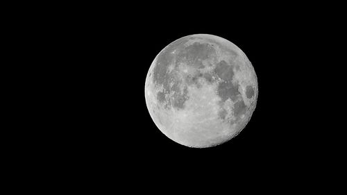 Scenic view of moon against sky at night